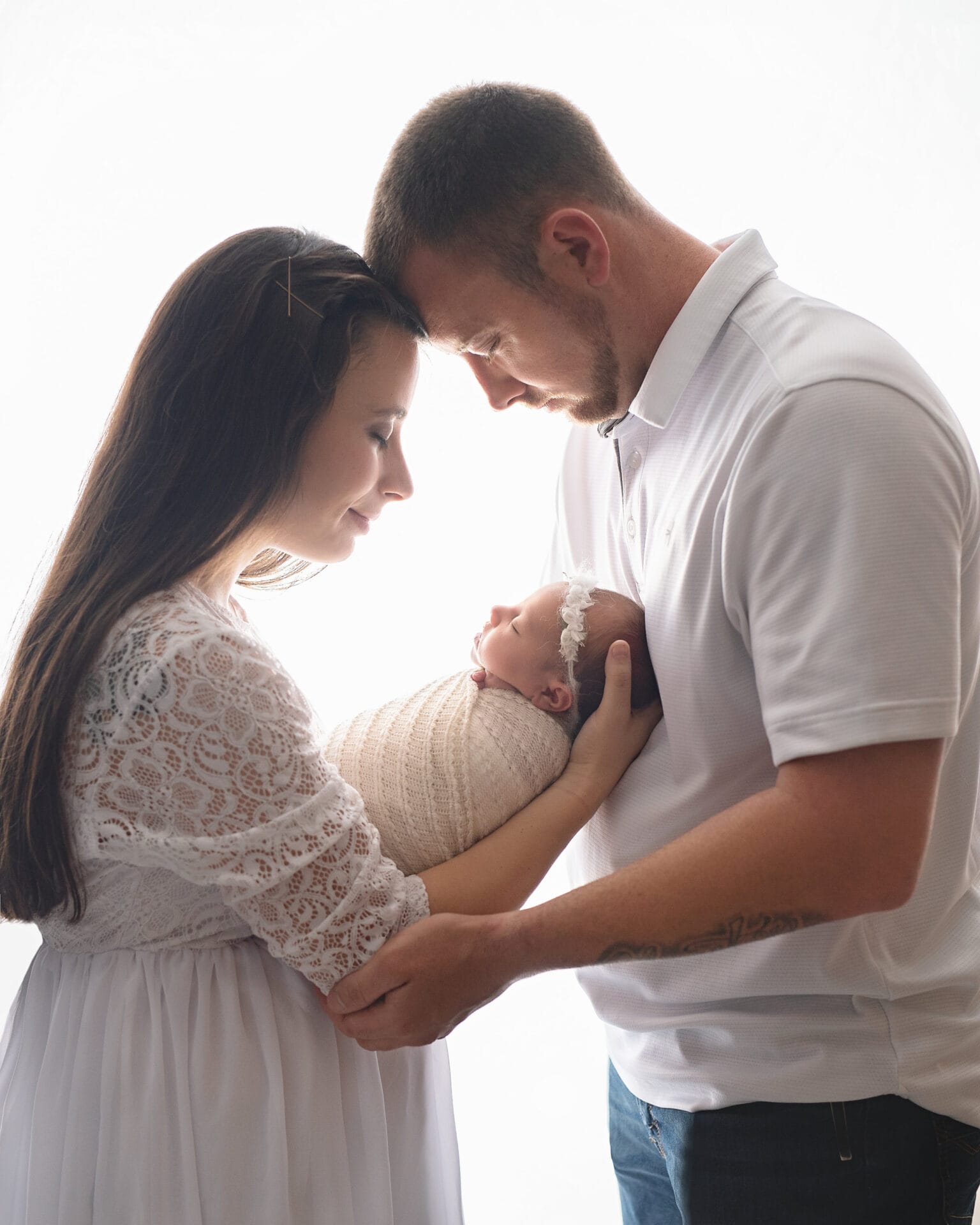 new parents with newborn baby girl photo shoot