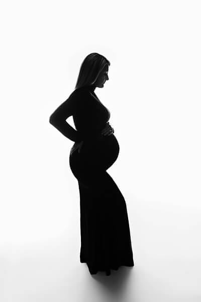 Silhouette of mother to be with Lafayette doulas.