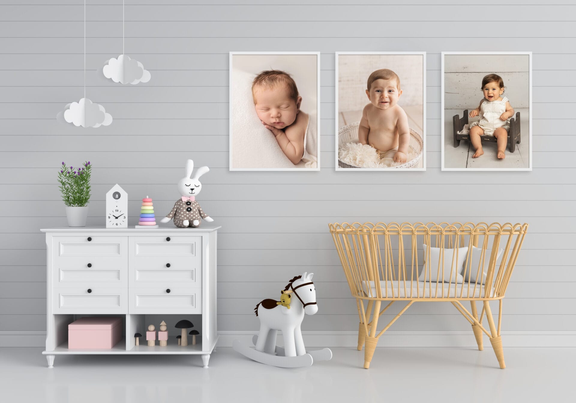 A boy's room with wall art from his one-year milestone photo sessions from the newborn, sitter, and one-year photo sessions. 