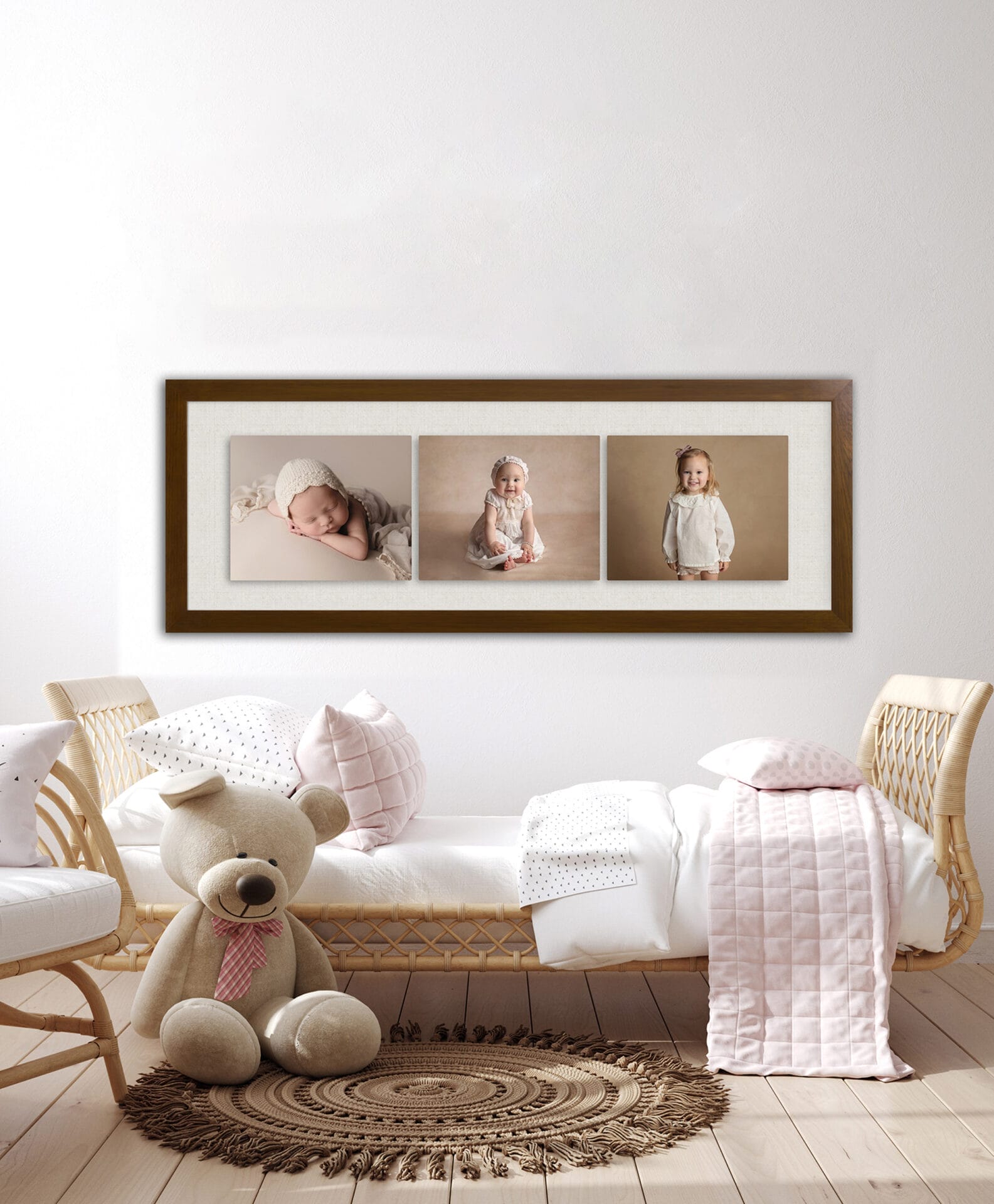 A little girl's room with a collage wall art of her one-year photo milestone sessions, including her newborn, sitter, and one-year sessions in Morgan City.